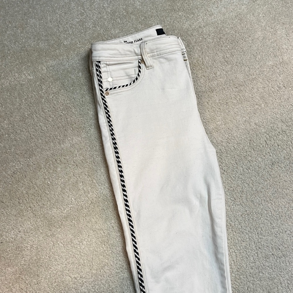 Cream with black stitching